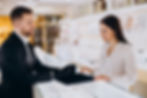 A phot of luxury retail customer service, a woman buying a ring in a luxury retail store