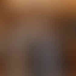 wedding guests in heart shaped glasses at the bar in Mythe Barn