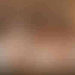 Bride and bridesmaids on morning of the wedding getting ready with Prosecco orange