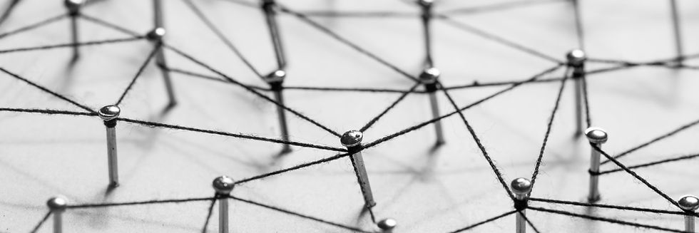 nails connected with thread symbolising a network