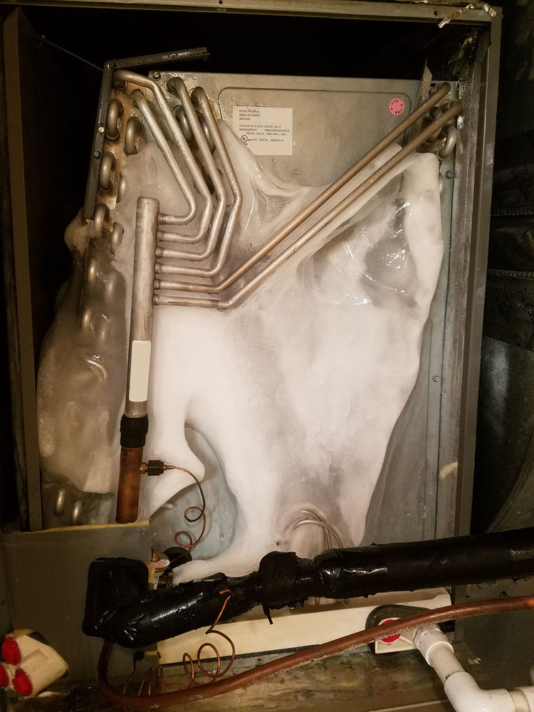 Troubleshooting an Air Conditioning System with a Frozen Evaporator
