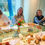 Thumbnail: Privé babyshower workshop • Regenboogmobiel & slinger