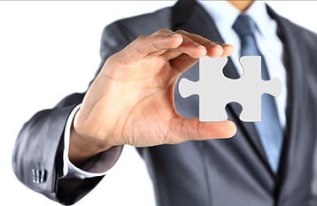 Man holding puzzle piece