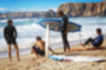 Surfers On Beach