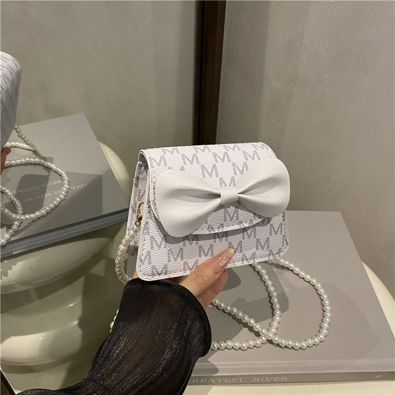 Thumbnail: High quality Pearl Charm Bow cross shoulder Bag