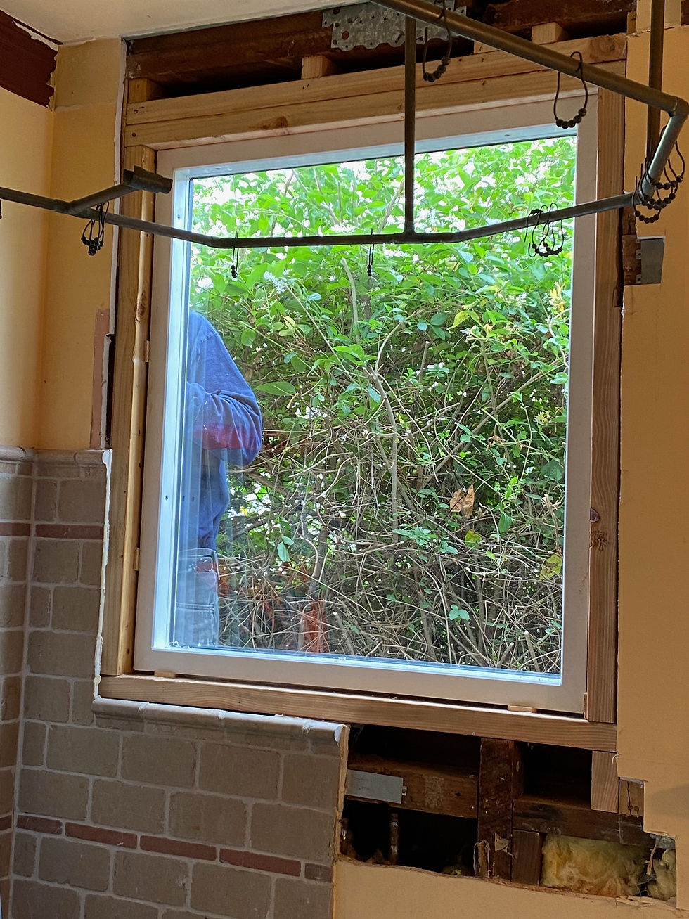 Framed in a new rough opening and installed a protective picture window.