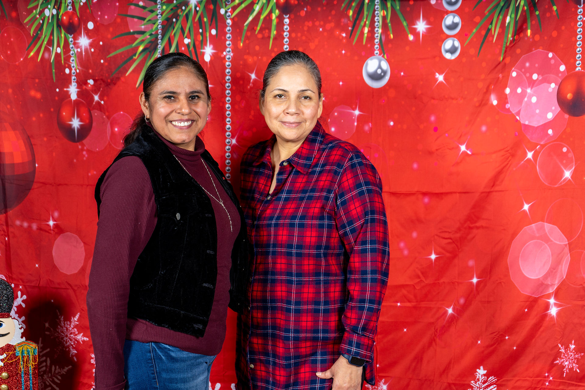 Photo booth fun at the 2024 Holiday Luncheon at DNA, a wholesale fashion accessories vendor