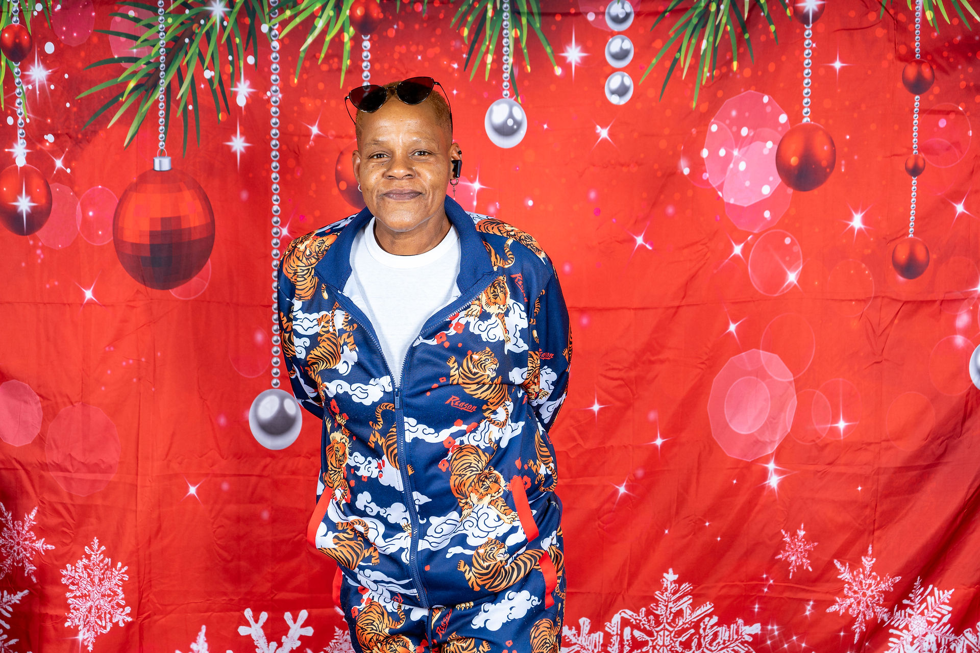 Photo booth fun at the 2024 Holiday Luncheon at DNA, a wholesale fashion accessories supplier