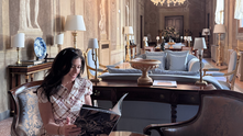 Travel advisor reading a magazine in a beautiful palace hotel in Florence.