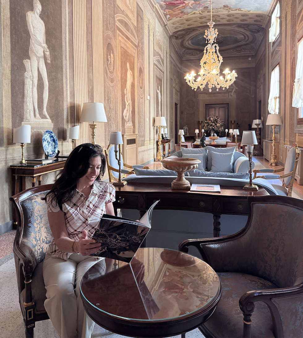 Travel advisor reading a magazine in a beautiful palace hotel in Florence.