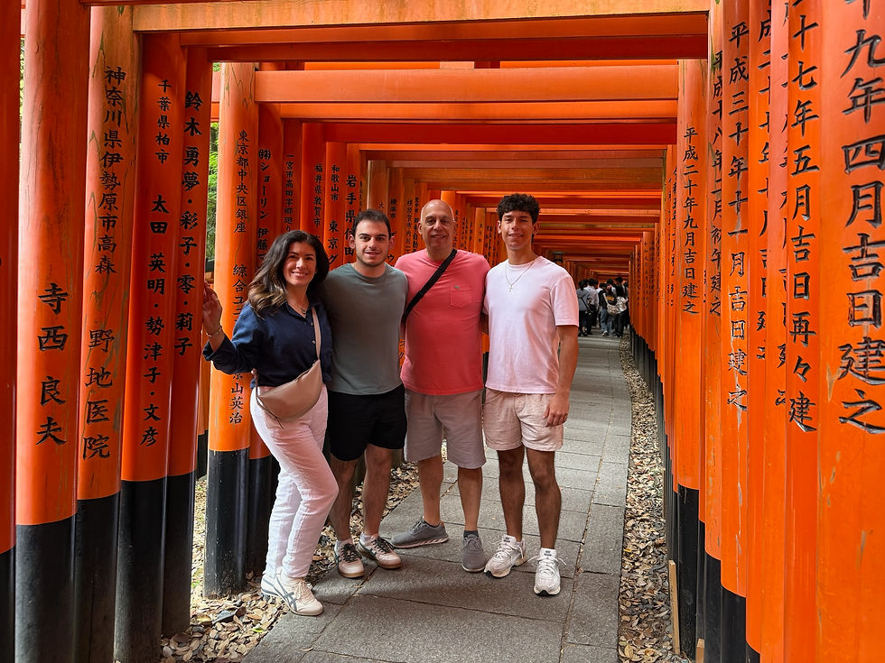 Family at Kyoto's Fushimi Inari Shrine, Japan
