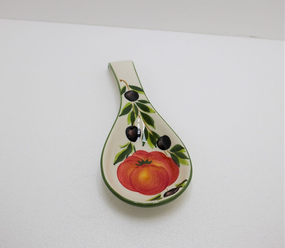 Thumbnail: Ladle rest with tomato and olive decoration
