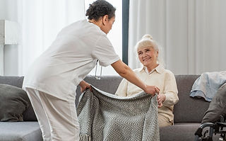 doctor-taking-care-senior-woman-home_edited.jpg