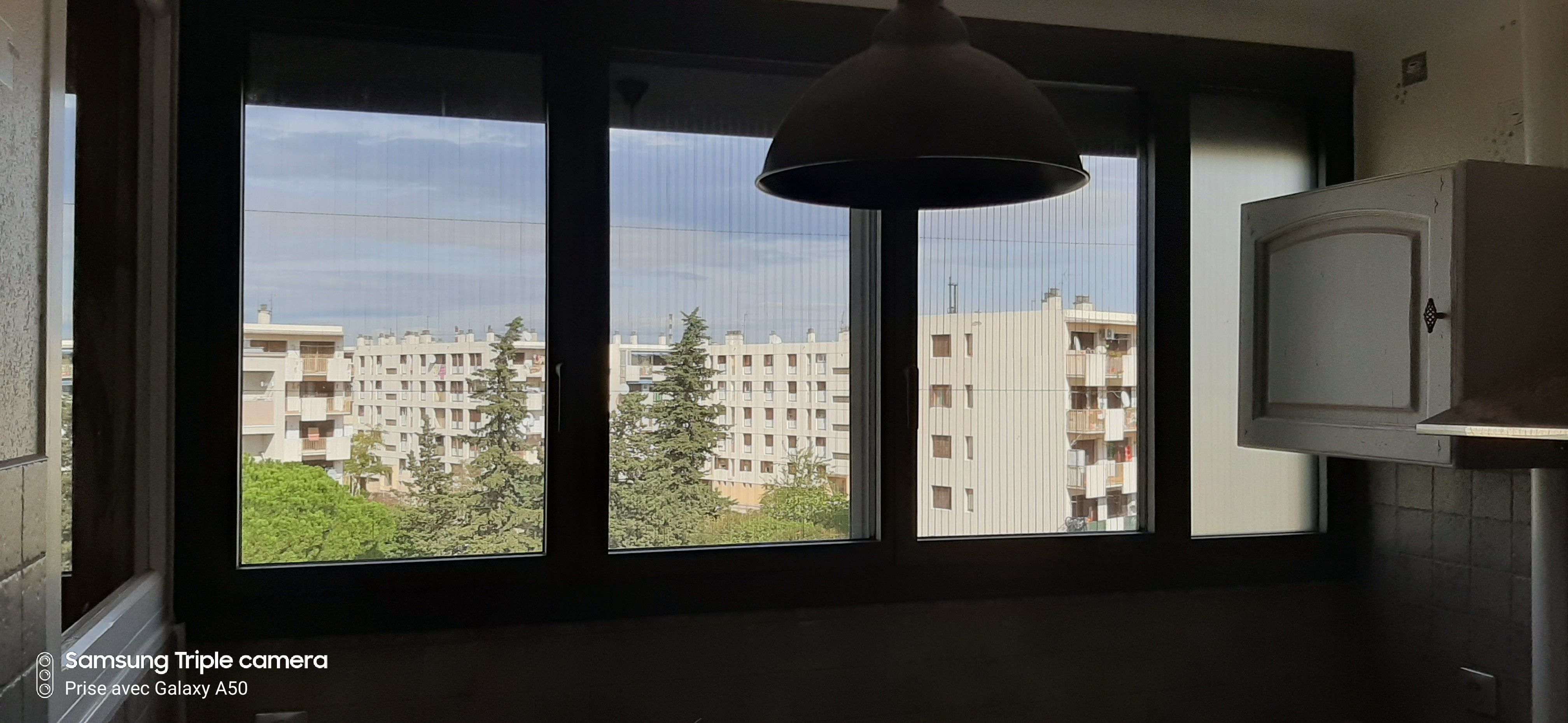 Fenêtre aluminium quatre vantaux