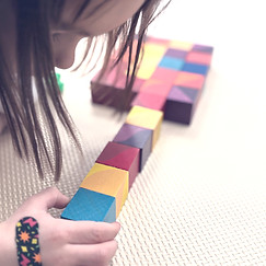 Child engaged in block play