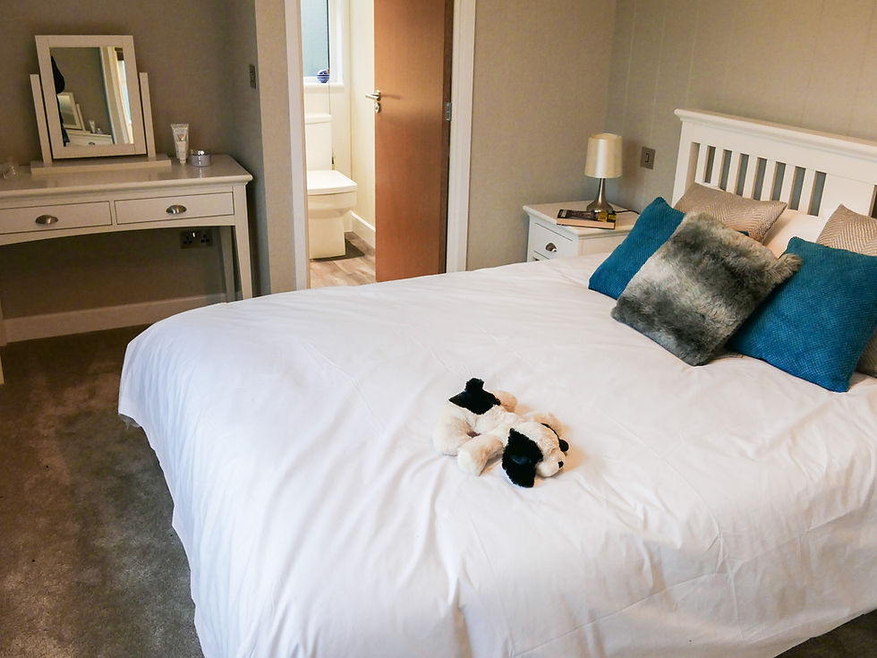 Wessex Classic Bespoke Luxury Lodge master bedroom and king sized bed