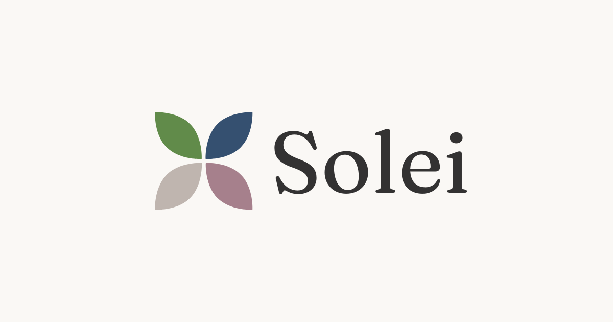 Solei app logo — four overlapping leaves in warm and cool tones representing color seasons