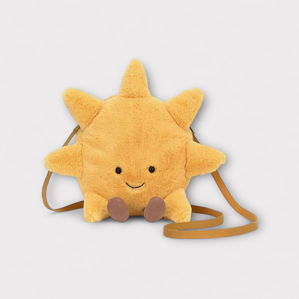 Cute sun-shaped plush bag with a smiling face and orange strap against a white background.