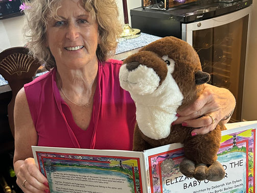 Holiday Show Reception will feature a new book launch