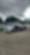Resgate de um Veículo SUV Automático que Rompeu um Muro no Qual Ficou Pendurado.