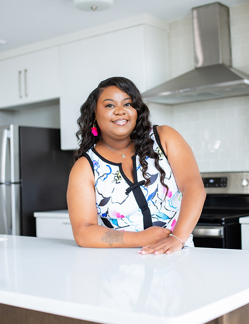 Image of Tania Marr, MSW, LCSW, CEO & Founder of Finer Solutions Therapy, LLC, posing for a photo. 