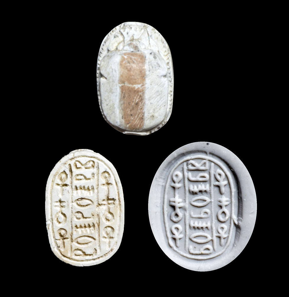 Egyptian scarab with magic formula upperside and underside with wax impression