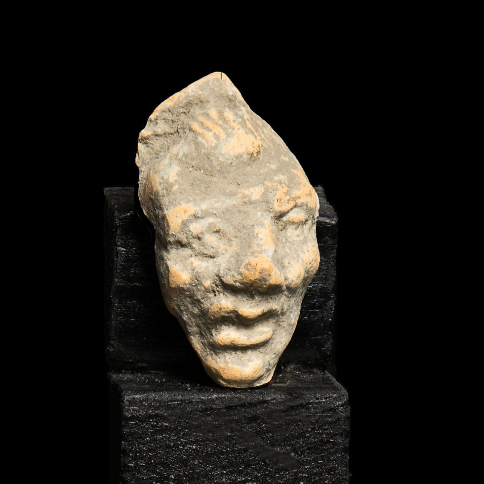Hellenistic Greek face of a grotesque mask