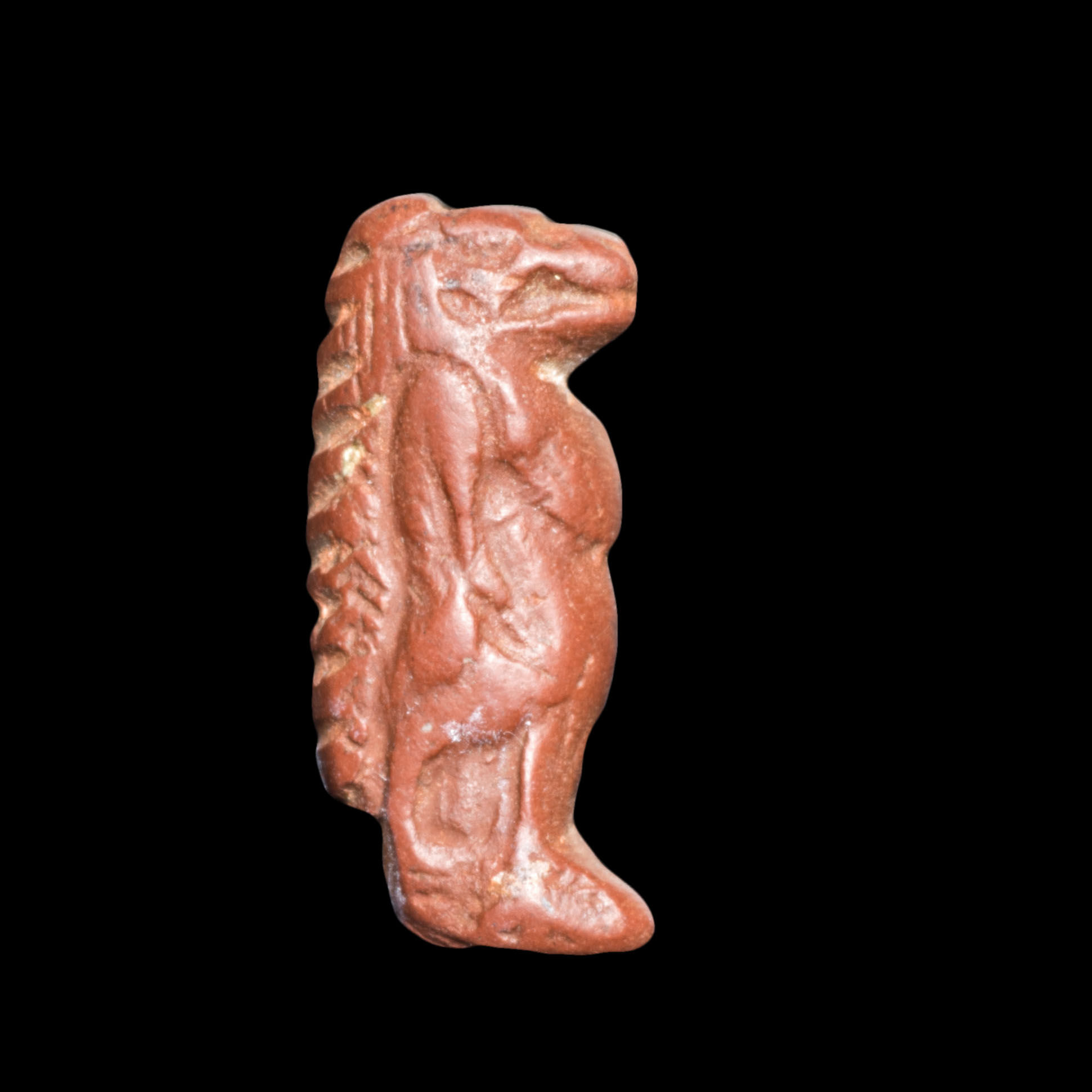 Front view of Ancient Egyptian red jasper inlay of Tawaret