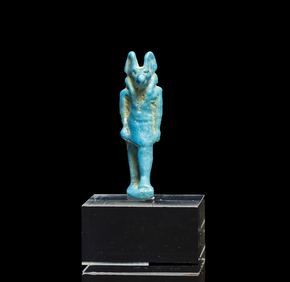 Thumbnail: Front view of Ancient Egyptian amulet of god Anubis on a stand