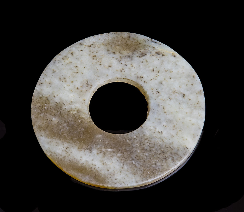 Thumbnail: Tilted view of Chinese Early Bronze Age Qija jade bi disc