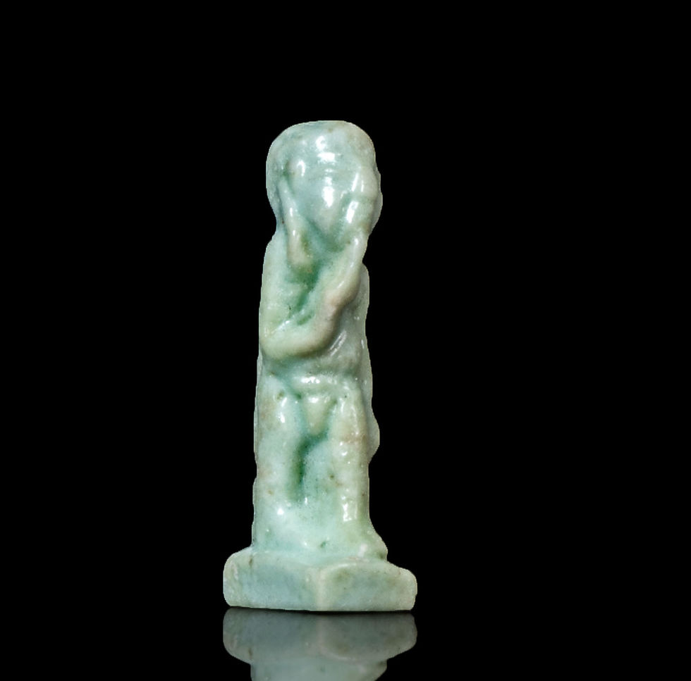 Ancient Egyptian faience amulet of the child god Harpocrates