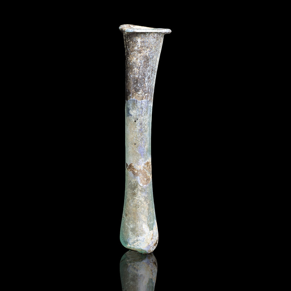 Side view of Ancient Roman glass unguentarium