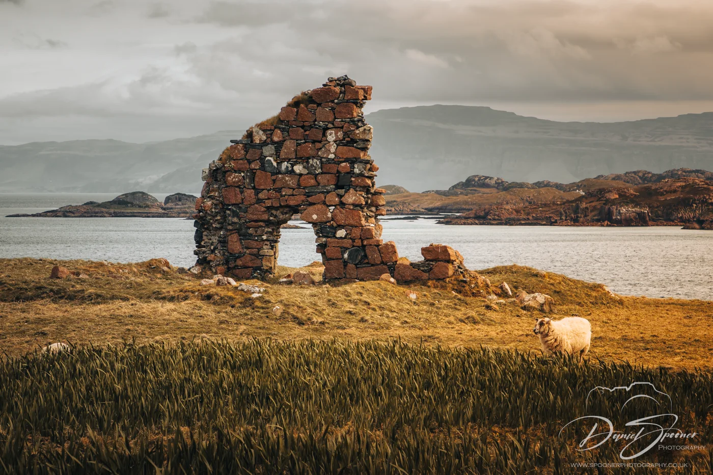 View near Iona Abbey showing arched stone window.