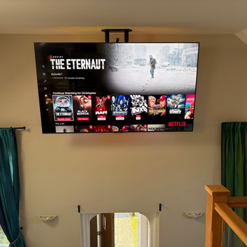 TV mounted on wall