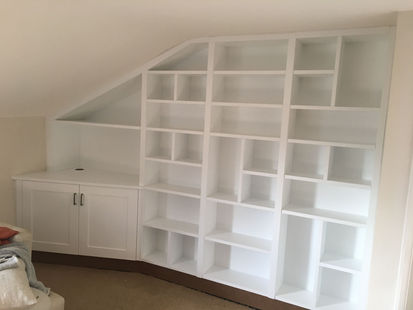 a large white cabinet in a home
