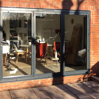 Grey bi-folding doors
