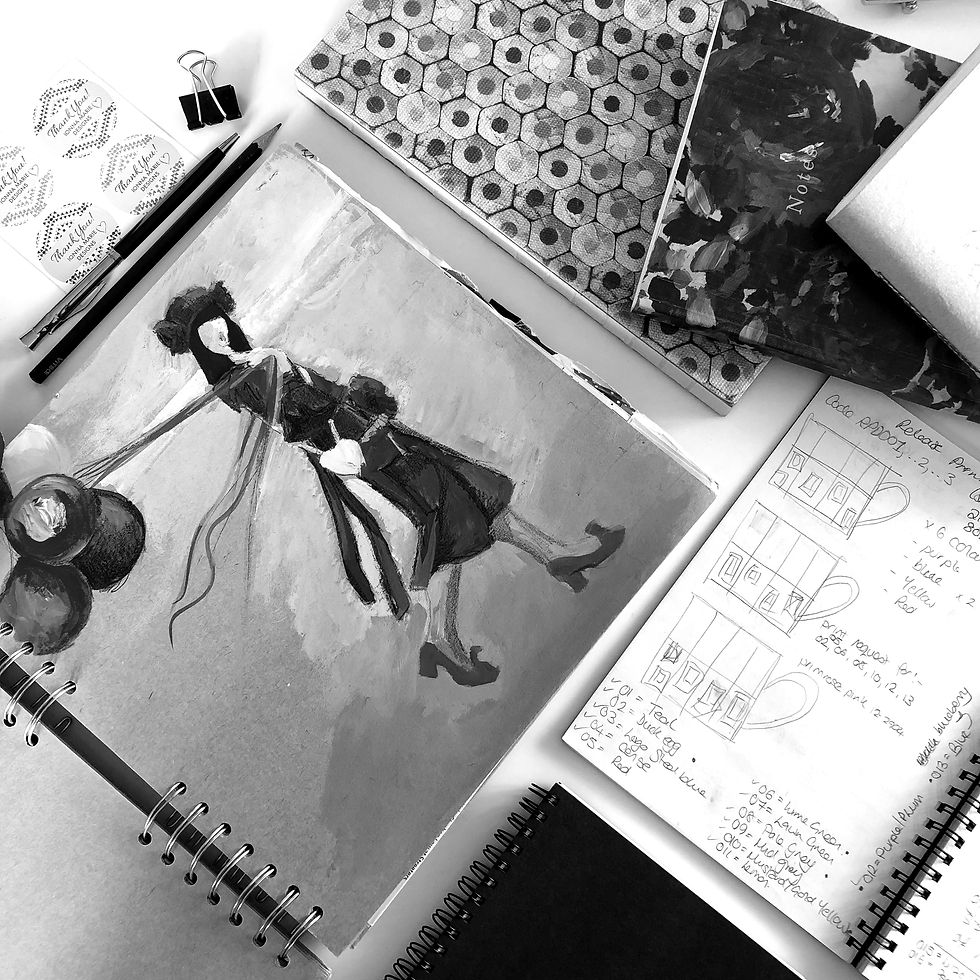 A selection of sketchbooks. Open books show a fashion illustration using gouche paint and