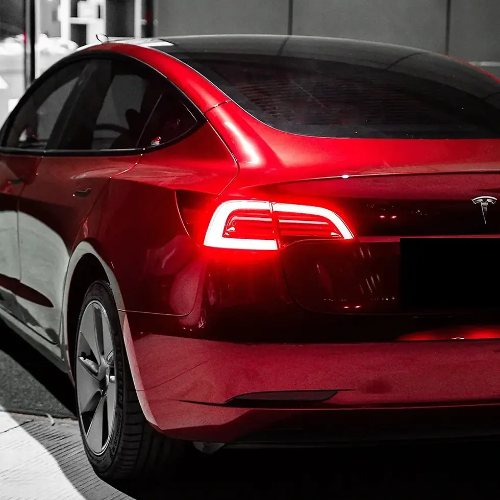 Miniature : Crimson Red Color PPF by Bespoke Wraps applied to a Tesla, front three-quarter view