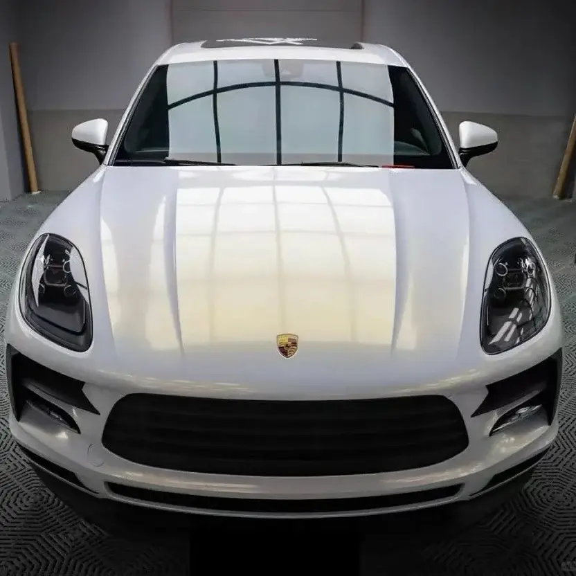 Miniature : Front view of a white SUV wrapped in Golden Halo gloss Color PPF, original color White to Gold, by Bespoke Wraps