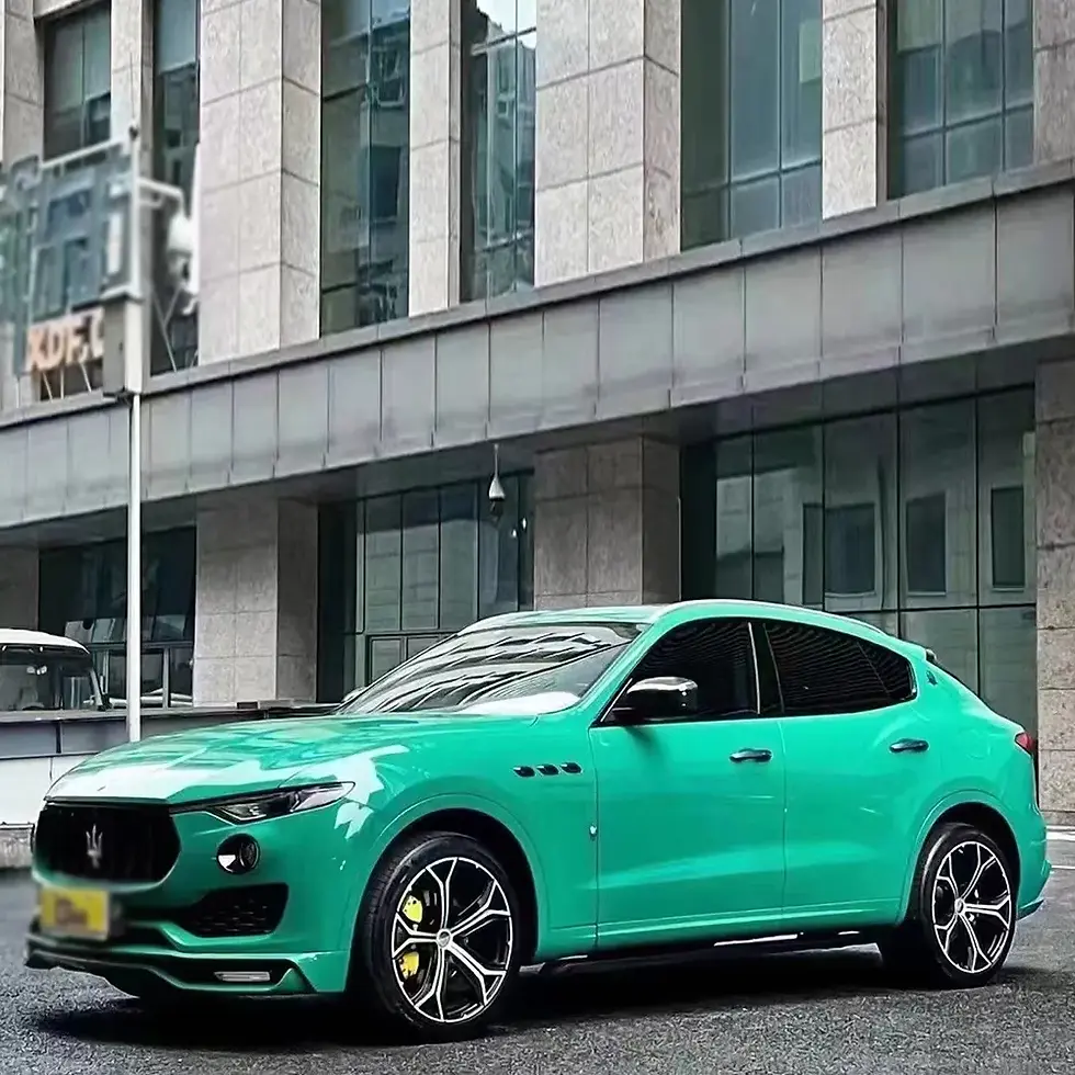 Miniature : Retro Green Color PPF applied to a BMW, front three-quarter view showing the glossy green finish by Bespoke Wraps
