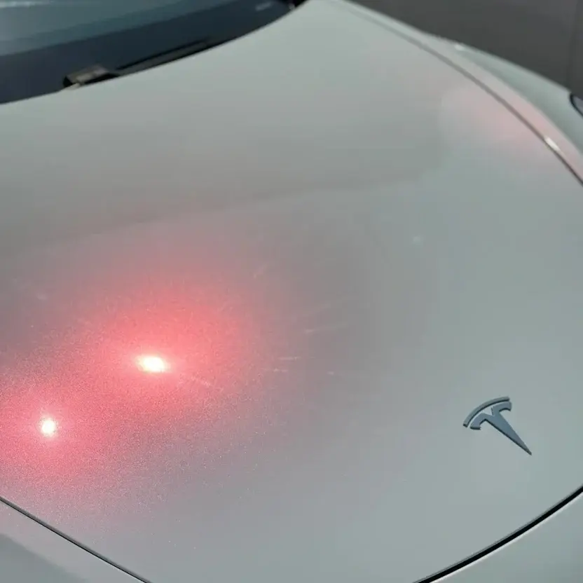 Miniature : Close-up of Red Diamond gloss Color PPF showing red metallic reflection