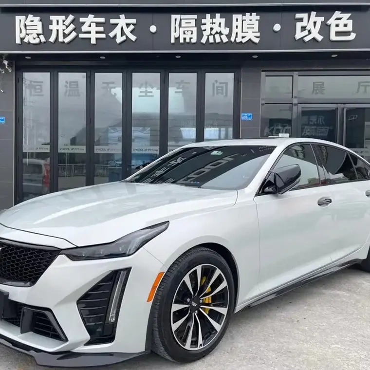 Miniature : Silver Fox Grey Color PPF applied to a Cadillac sedan, front three-quarter view by Bespoke Wraps