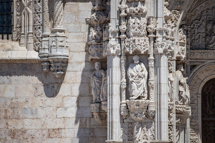 Intricate stone carvings and statues adorn a building in Lisbon, Portugal. Jeff Bana Photography