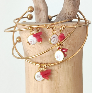 Bracelet jonc œil de Ste Lucie et corail.