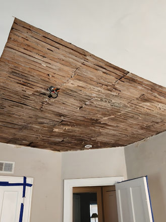 Drywall ceiling removal after water damage.