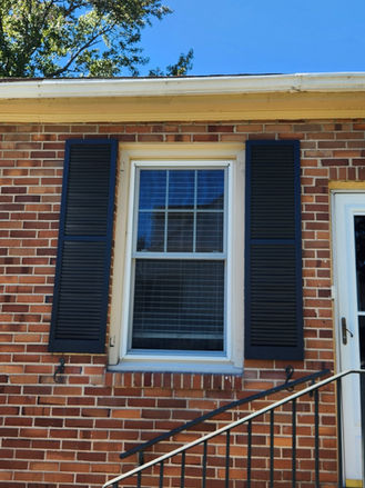 Restored and repainted exterior window shutters, enhancing curb appeal and giving the brick home a clean, refreshed appearance.