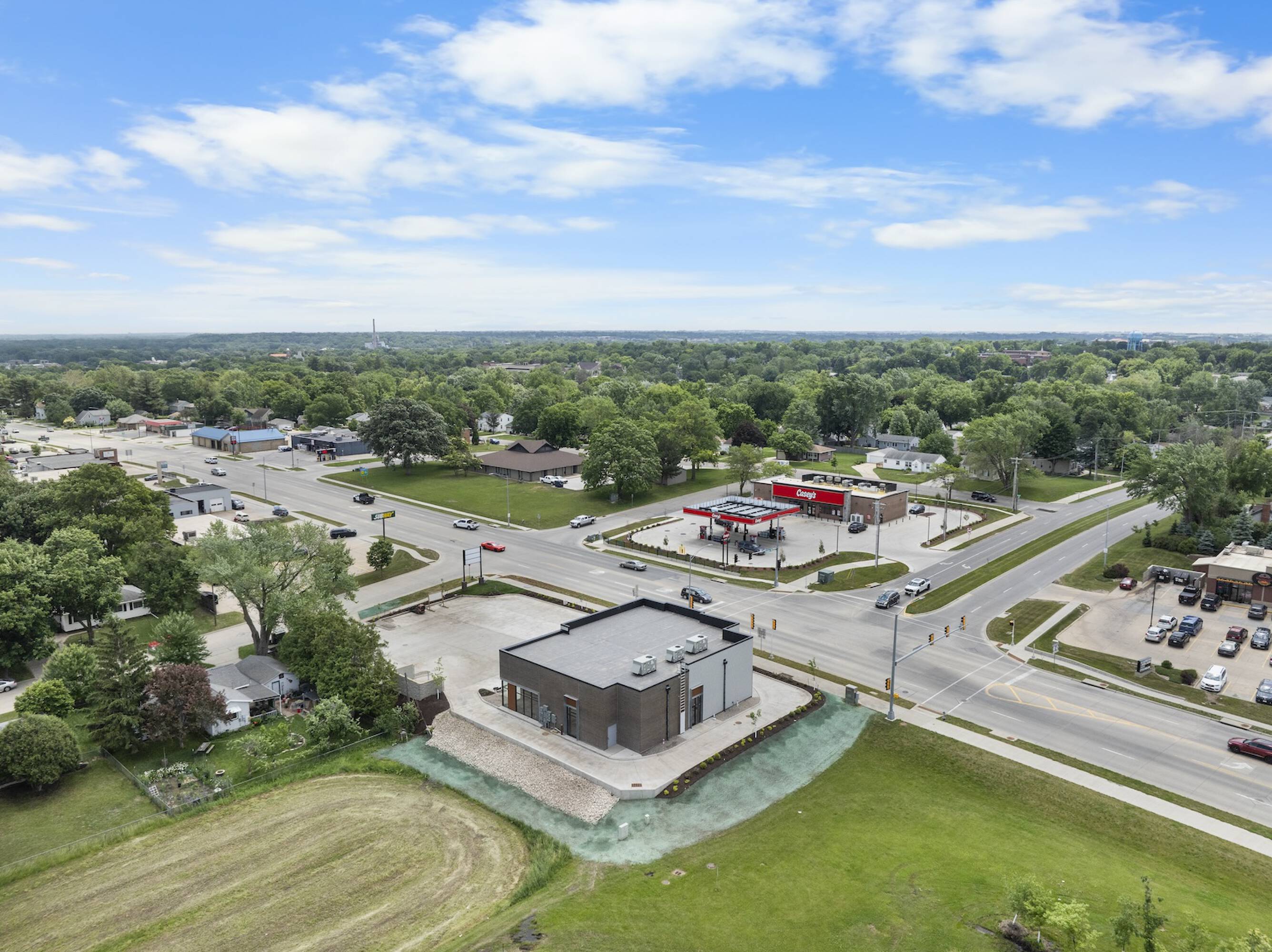 1621 W 1st St, Cedar Falls: Prime Strip Center Opportunity at Iowa's Busiest Available Intersection