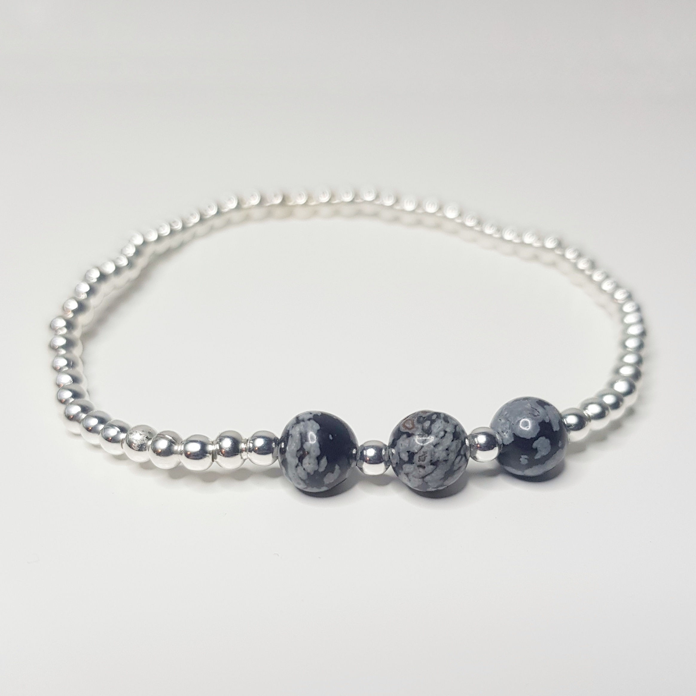 Snowflake Obsidian Triple Crystal Bracelet