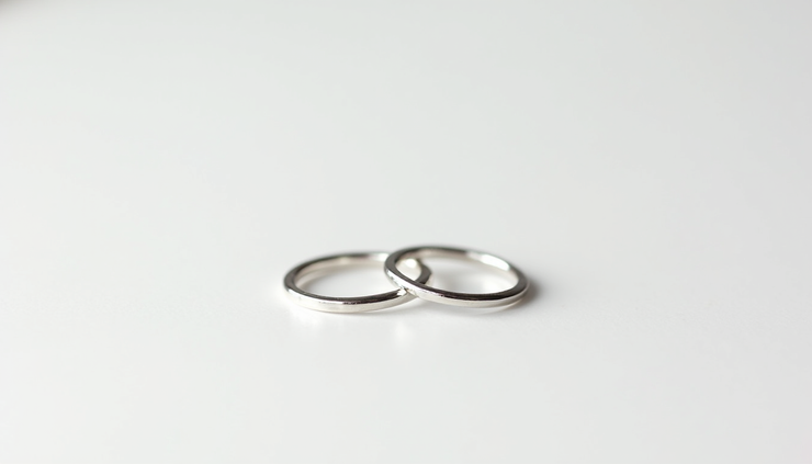 Eye-level view of a minimalist ring set made from recycled silver