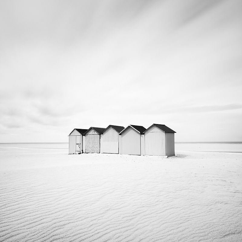 5 Cabins or Beach Huts on the atlantic ocean. Beach of Ouistreham, Normandy region. France, Europe.